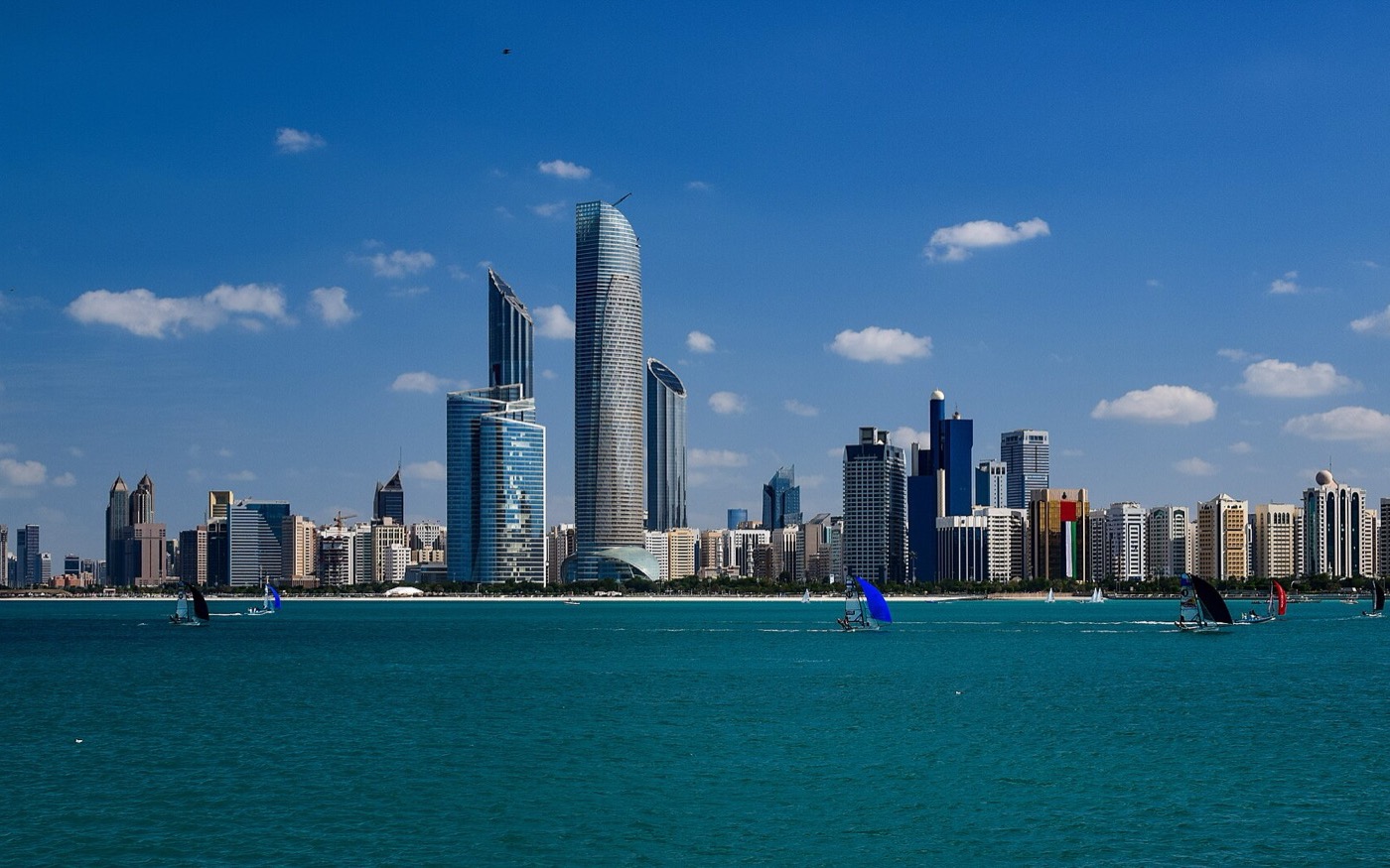 Free travel insurance into Abu Dhabi: why I read it as a property signal