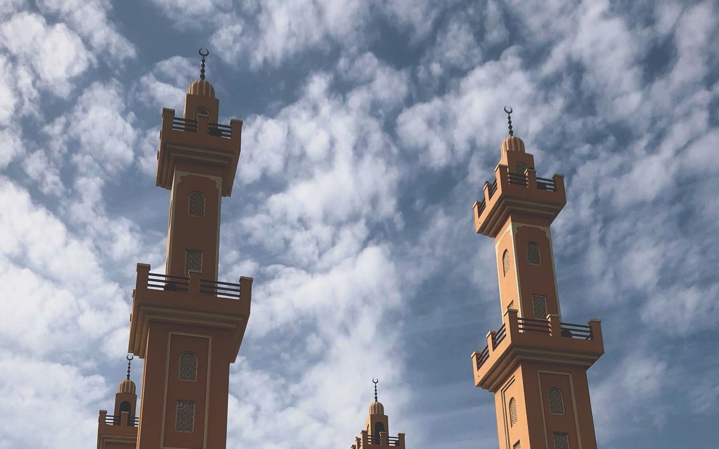 Minarets against a clouded sky